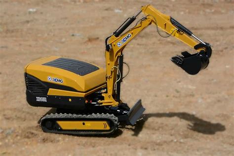 guy stands on mini rc excavator|remote control rc excavators.